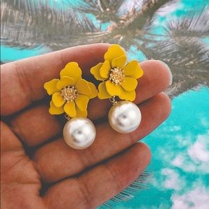 Three dimensional flower pearl earrings